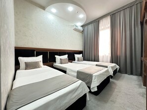 Standard Triple Room | Hypo-allergenic bedding, individually decorated, individually furnished