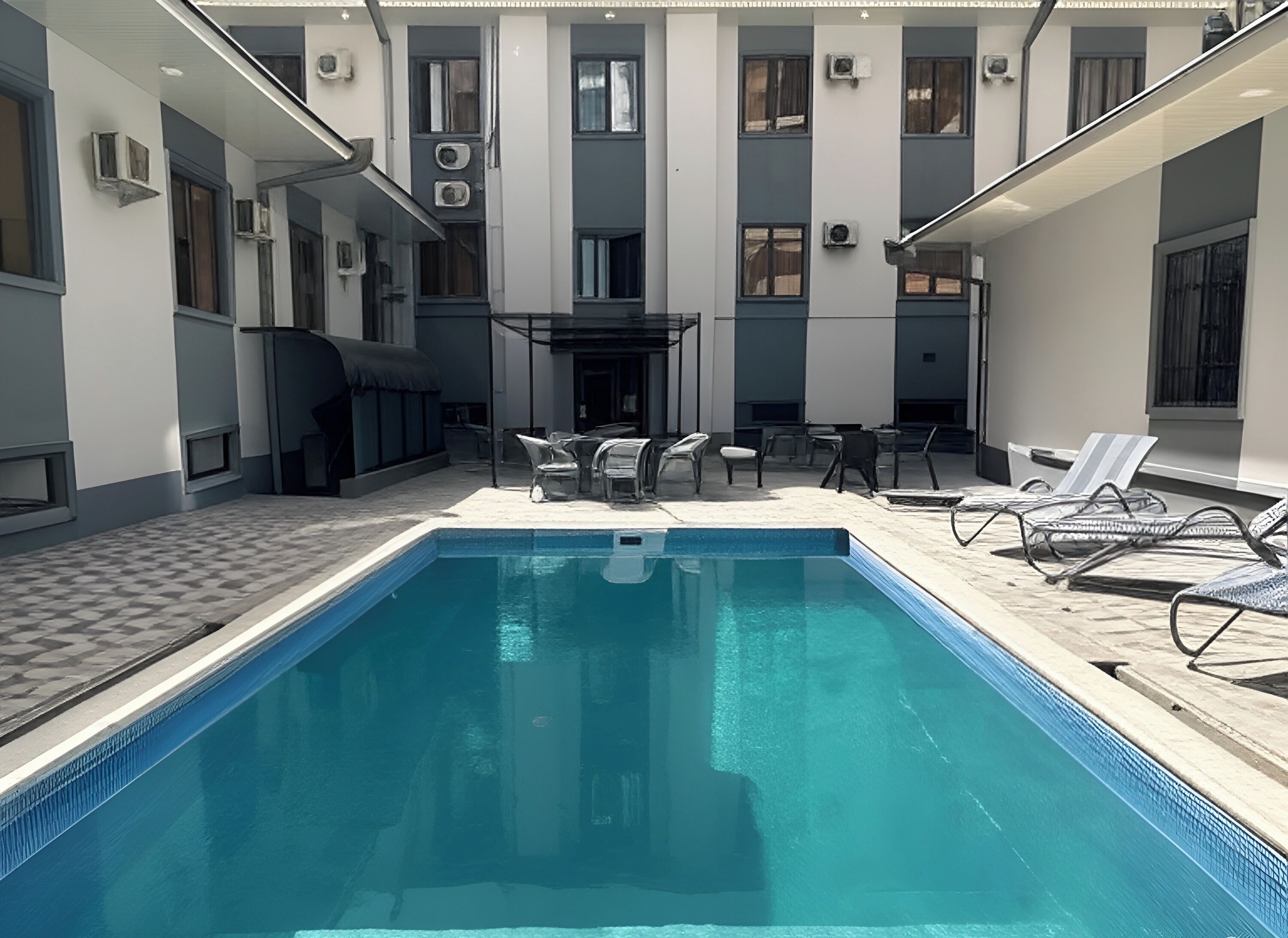 Outdoor pool, pool umbrellas, pool loungers