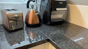 Fridge, microwave, coffee/tea maker, toaster