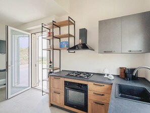 Microwave, oven, cookware/dishes/utensils