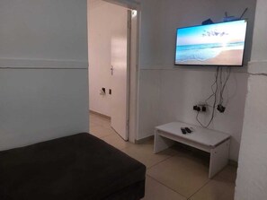 Comfort Apartment, Air conditioning | Living area | Flat-screen TV