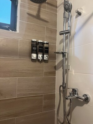 Shower, hair dryer, towels, soap
