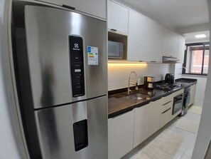 شقة بتجهيزات أساسية | مطبخ خاص