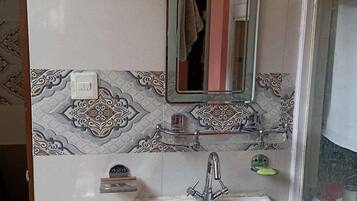 Shower, bidet, towels, soap