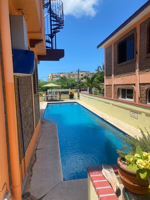 Outdoor pool, sun loungers