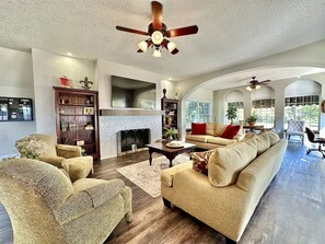 Smart TV, fireplace, foosball, books