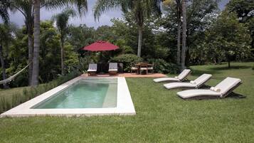 Outdoor pool, pool umbrellas, pool loungers