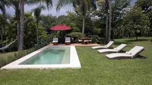 Outdoor pool, pool umbrellas, sun loungers