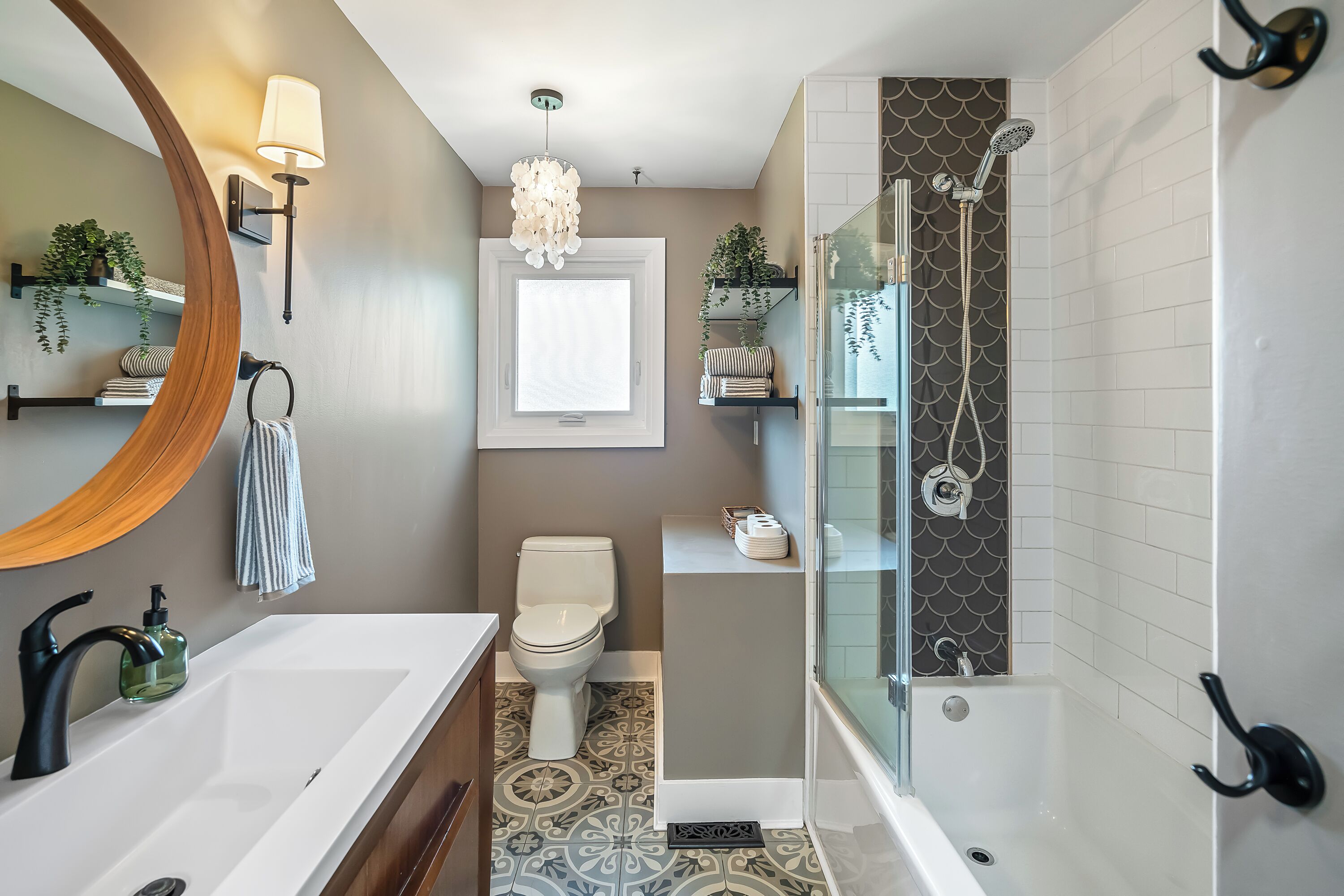 Main level bathroom, towels, shampoo, body wash, hairdryer, hand soap