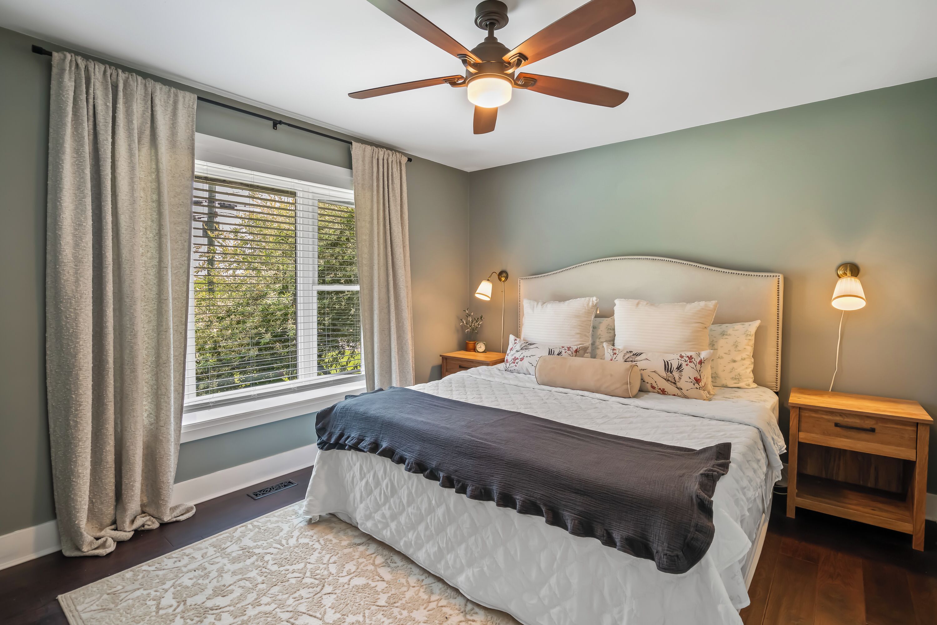 Master bedroom, king bed, room darkening curtains, closet, dresser, fan