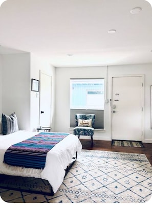 1 bedroom, desk, iron/ironing board, travel crib