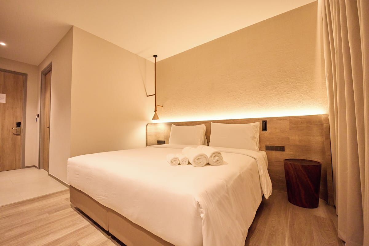 Deluxe Double Room, City View | In-room safe, desk, laptop workspace, blackout drapes