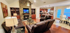 Smart TV, fireplace, books