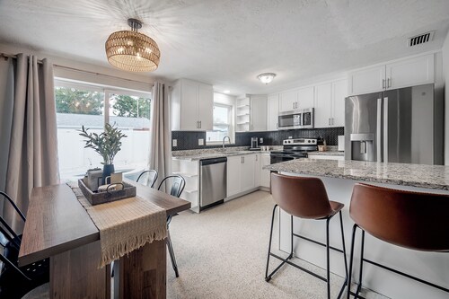 3 Bedroom 2 Bathroom HEATED POOL home with putting green!