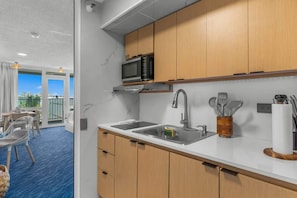 Fridge, microwave, coffee/tea maker, toaster
