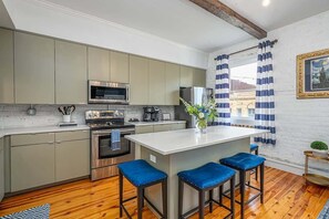 Fridge, microwave, oven, stovetop - Blue Belle on Broughton-Luxury 2 Bed 1 Bath Condo (Savannah)