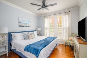 1 bedroom, desk, iron/ironing board, travel crib