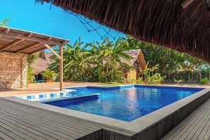 Outdoor pool, pool umbrellas, sun loungers