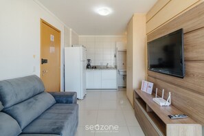 Apartamento básico | Área de estar | Smart TV 32 polegadas com canais digitais
