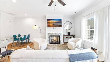 TV, fireplace, books