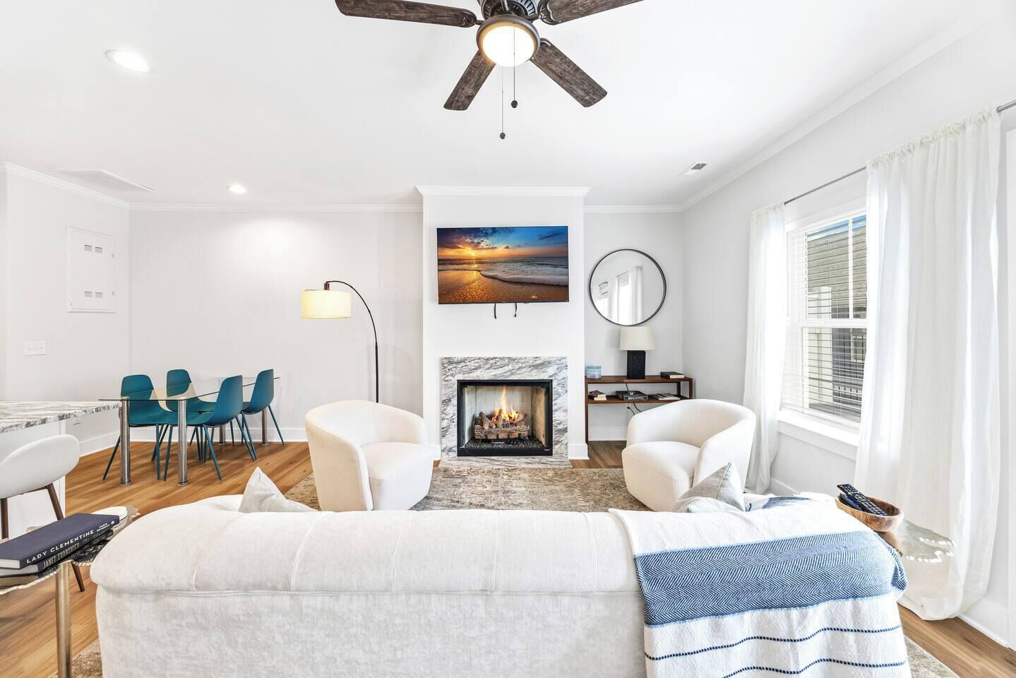 TV, fireplace, books