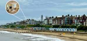 On the beach, sun-loungers