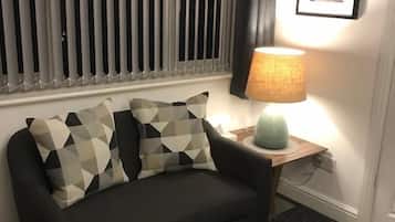 Quarto casal superior | Área de estar