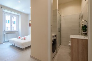 Hair dryer, bidet, towels, soap