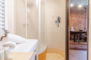 Shower, free toiletries, hair dryer, towels