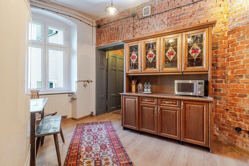 Gliwice Industrial Brick Style Apartment