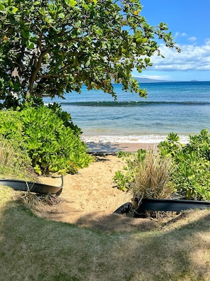 On the beach, sun-loungers, beach towels
