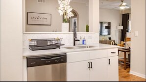 Coffee/tea maker, fridge, microwave, oven