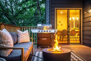 An outdoor deck with a grill, a fire pit, and a sofa with cushions. - Perfect Summer - Free Pool Access + Prime Location (McGaheysville)