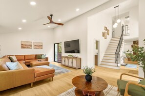 Smart TV, fireplace, foosball, books