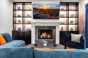 Smart TV, fireplace, video games, ping pong