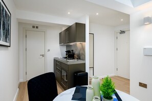 Fridge, microwave, dishwasher, coffee/tea maker