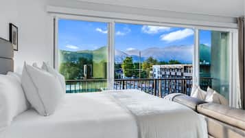 1 bedroom, desk, iron/ironing board, travel crib