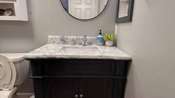 Hair dryer, towels, soap, toilet paper