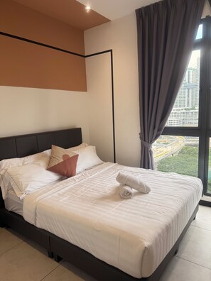 Standard Apartment, 2 Bedrooms, City View | Desk, laptop workspace, blackout curtains, soundproofing - Downtown Retreat 2BR at Neu Suites (Kuala Lumpur)