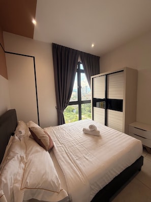 Standard Apartment, 2 Bedrooms, City View | Desk, laptop workspace, blackout drapes, iron/ironing board