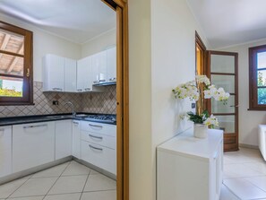 Fridge, microwave, cookware/dishes/utensils