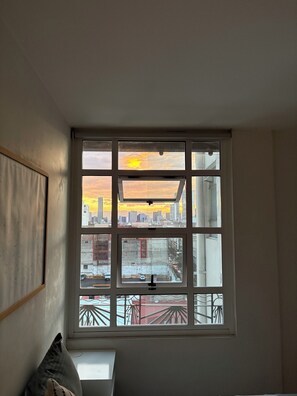 Family Apartment, City View | In-room safe, desk, laptop workspace, blackout curtains