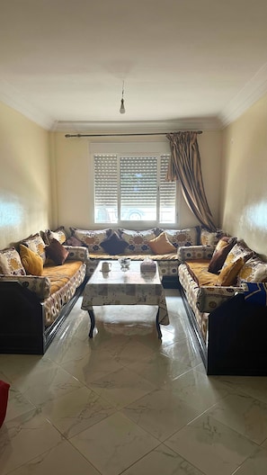 Comfort Apartment, 2 Bedrooms | Living area | 55-cm Smart TV with digital channels