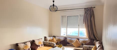 Comfort Apartment, 2 Bedrooms | Living room | 55-cm Smart TV with digital channels