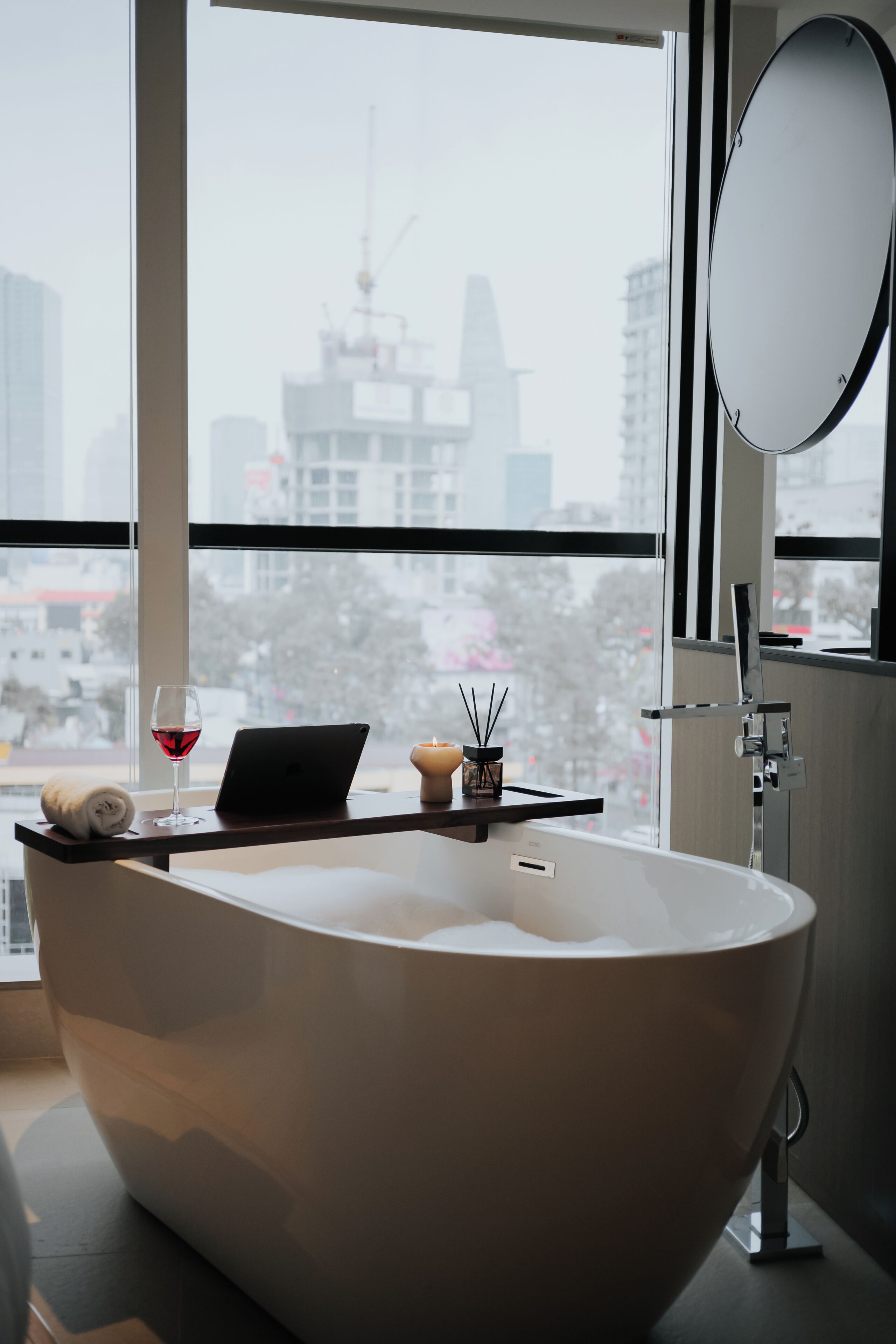 Suite, City View | Bathroom | Hair dryer, slippers, towels, soap