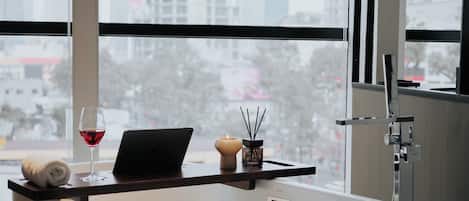 Suite, City View | Bathroom | Hair dryer, slippers, towels, soap