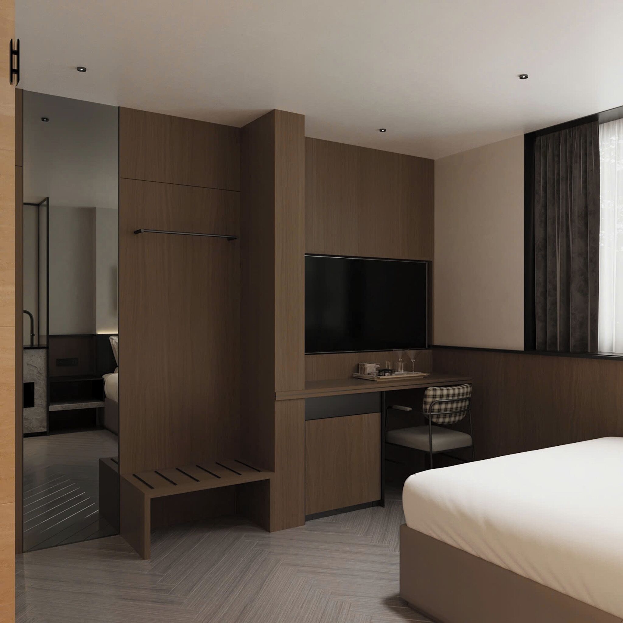 A modern hotel room with a bed, a desk, a chair, a flat-screen TV, and a wardrobe.