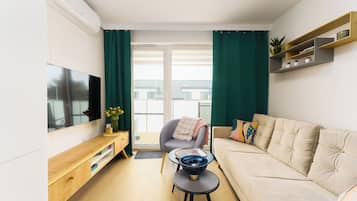 Apartment, Kochnische, am Strand | Laptopgeeigneter Arbeitsplatz, Verdunkelungsvorhänge, kostenloses WLAN