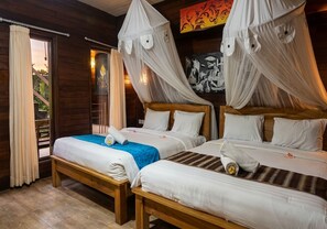 Family Room, 2 Queen Beds | In-room safe, desk, laptop workspace