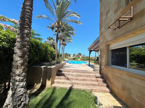 Specious Northern Coast Twin Villa – 6BR, Pool & Water Views, Peaceful escape.